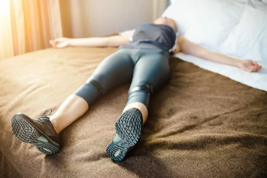 Woman having a rest after run and hard workout.